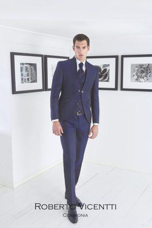 Traje de novio azul noche con cuello mao y chaleco jacquard labrado
